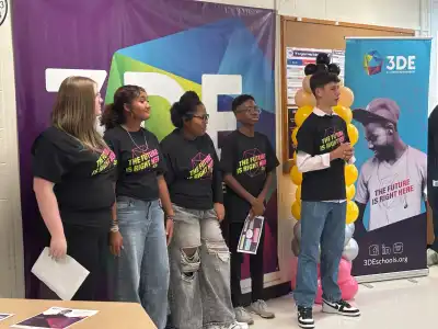 Image of 5 students in a classroom